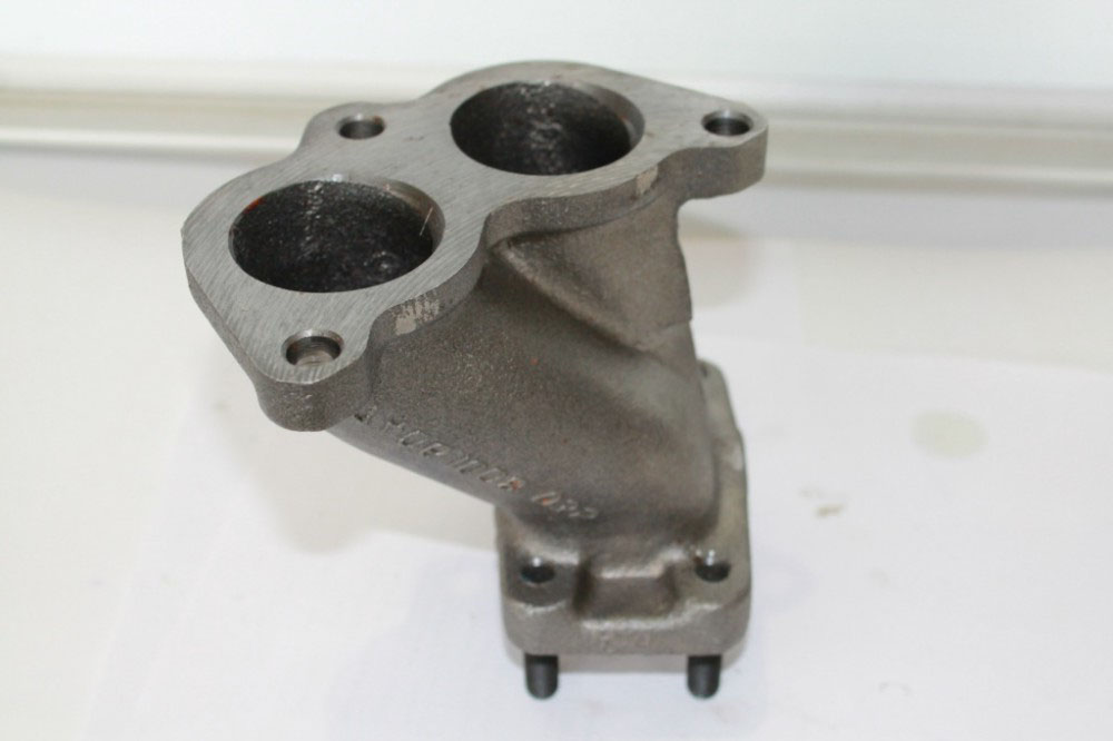 купить Патрубок выпускного коллектора (левый) на 6520